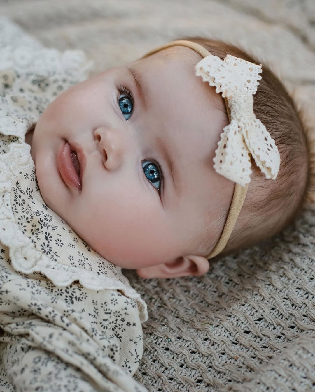 Baby girl with bright blue eyes